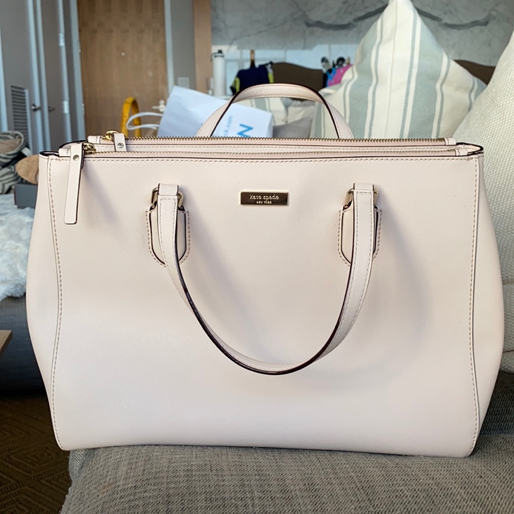 Light Pink Kate Spade handbag with shoulder strap